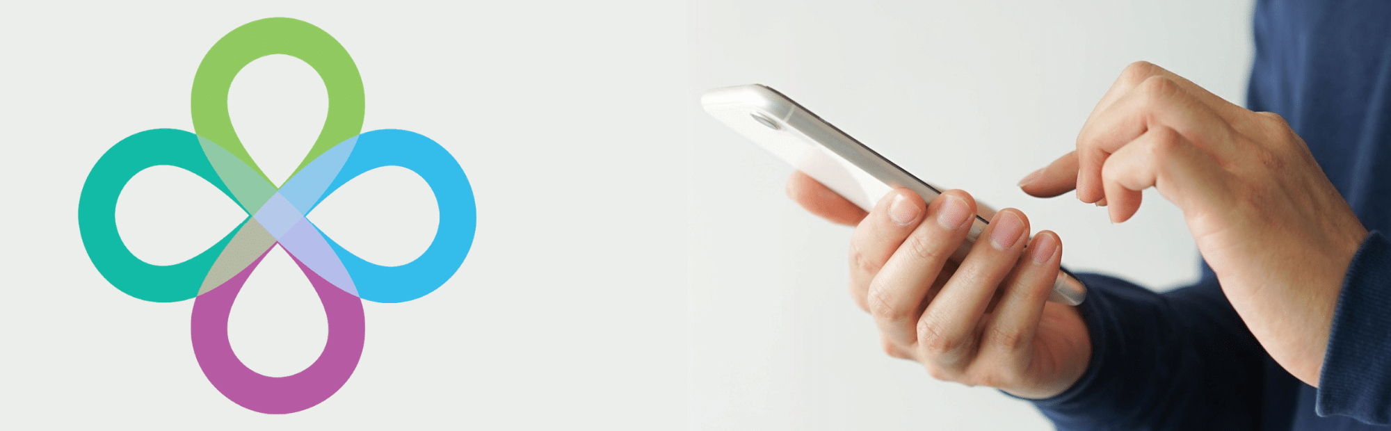 A colourful Fusion Occupational Health logo beside a close‑up of hands holding a smartphone, suggesting the use of digital technology.